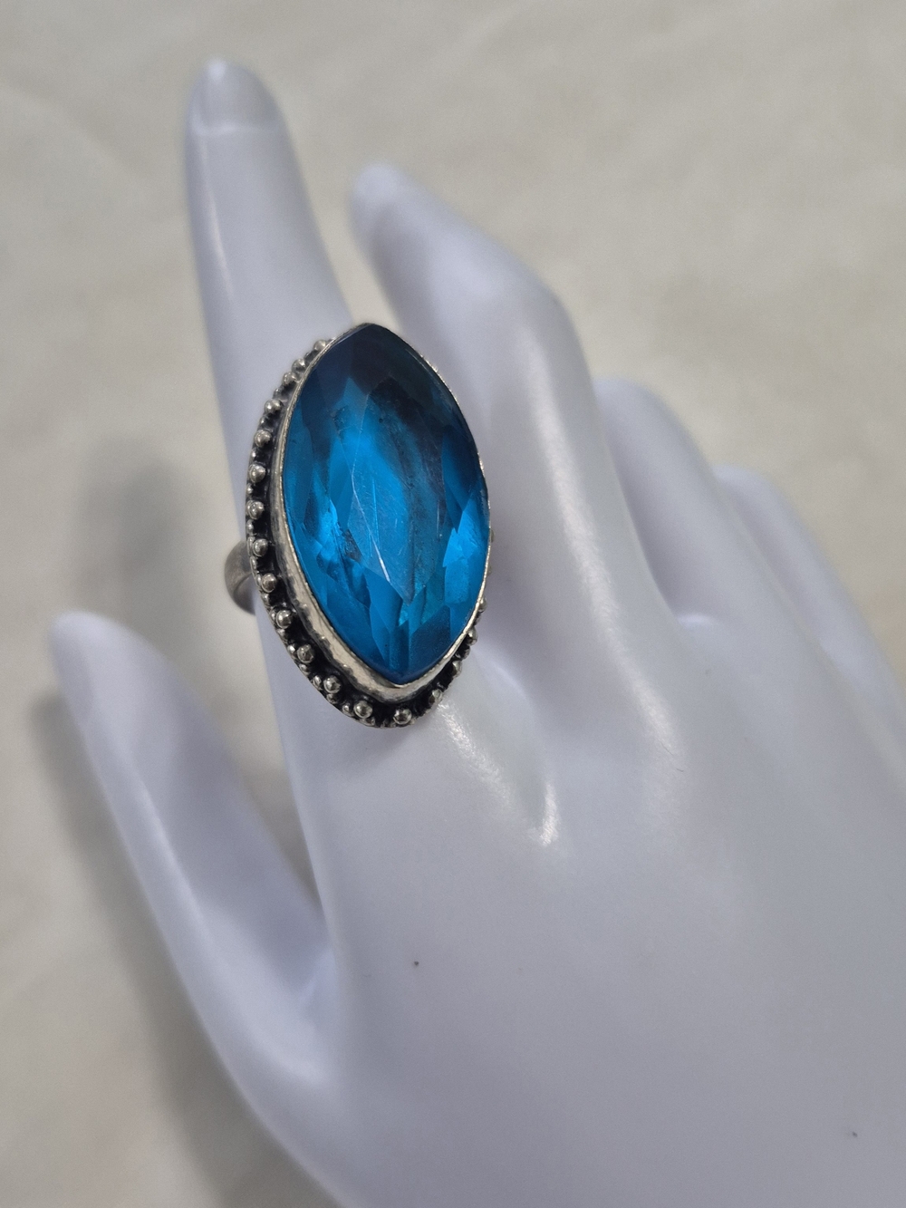 925 Silver Chunky Marquise Blue Stone with A Textured Bezel Setting.